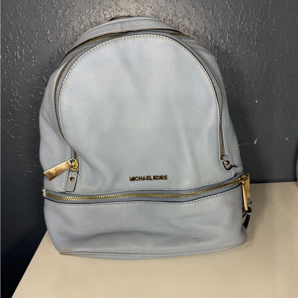 Michael Kors Handbags - Michael Kors Sky Blue Backpack with Gold Details
